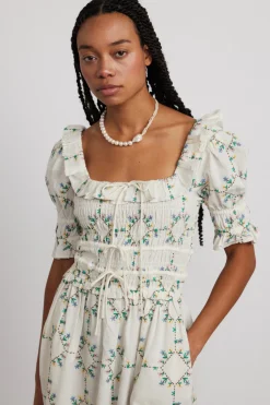 heidi embroidered midi dress
