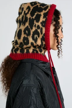 hood in leopard with red tie